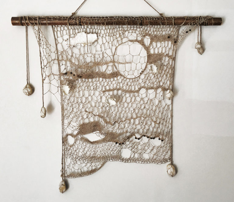 (Linen, handmade paper, river stones, jasper beads, bamboo rod, 31" x 36" x 2.5")