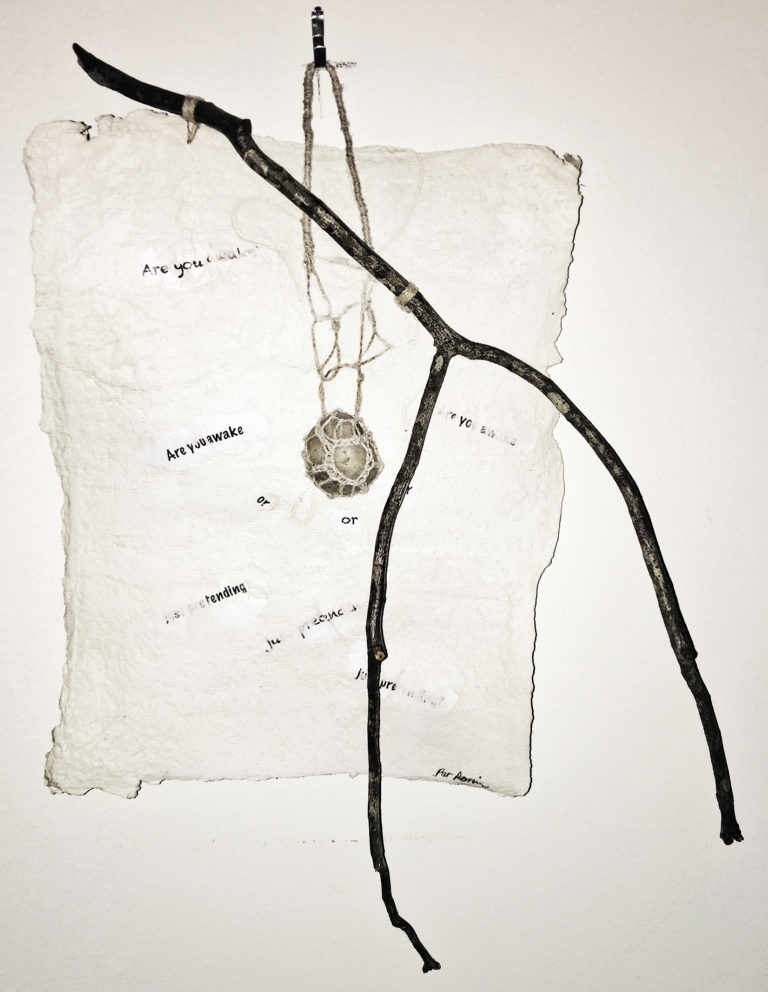 Handmade paper, linen, river stone, twig, 16x12x2.)