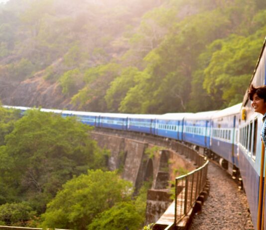 this train rides through dusk