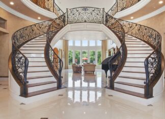 Convent white wooden chairs on white floor tiles