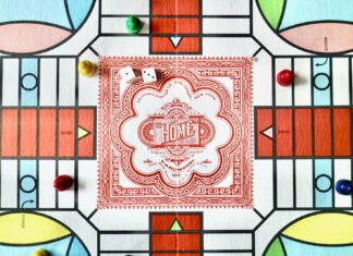 Parcheesi red white and green floral textile
