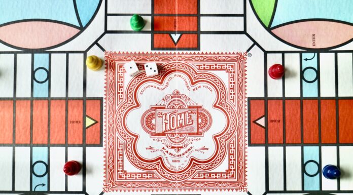 Parcheesi red white and green floral textile