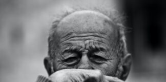 COUNTRY LIFE man grayscale photo