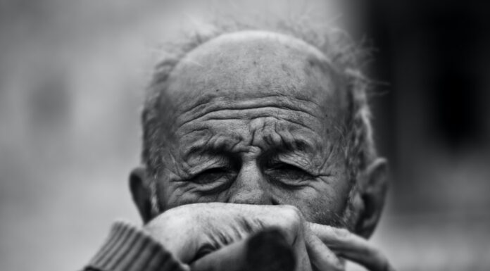 COUNTRY LIFE man grayscale photo