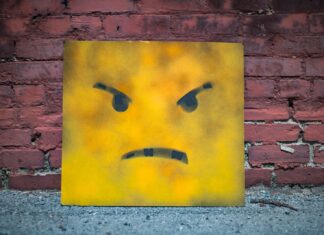 I’ll text you back anyway yellow and black smiley wall art