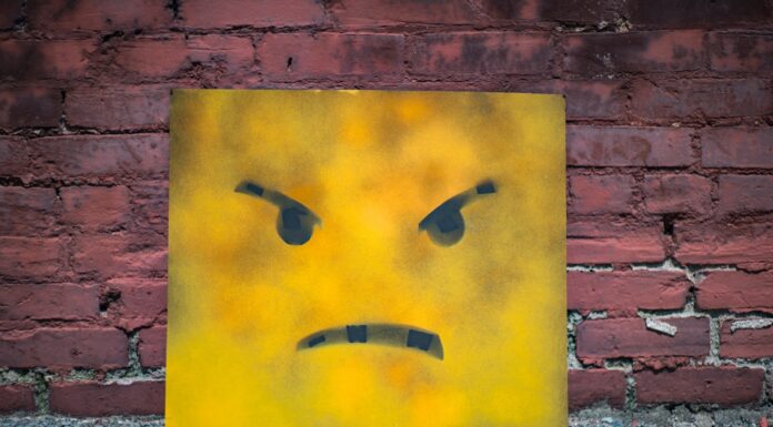 I’ll text you back anyway yellow and black smiley wall art