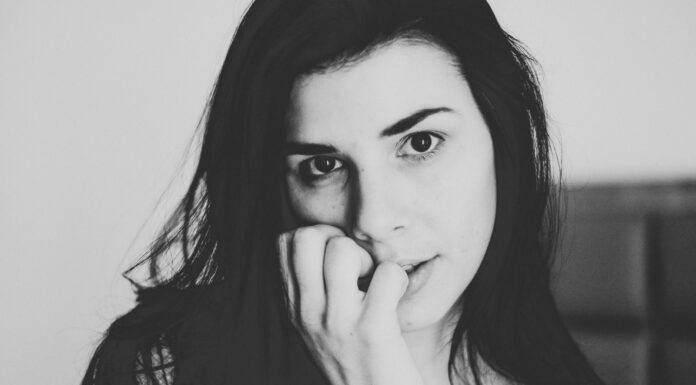 Hips like there’s no water near grayscale photo of woman with hand on her face