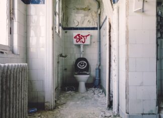 Passing the Buk white ceramic toilet bowl