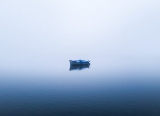 cool air warm water boat on ocean