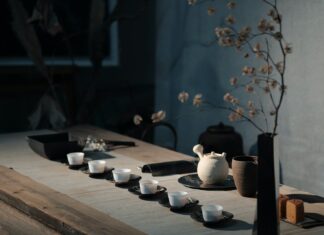 Sour Moon white flowers on black ceramic vase