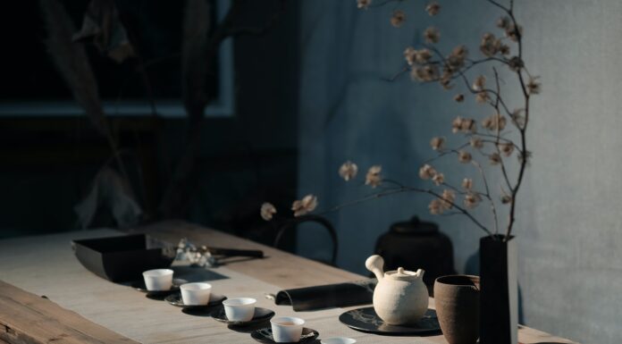 Sour Moon white flowers on black ceramic vase