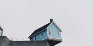 Apologies, but this is how i feel tonight blue concrete storey house on top of building at daytime