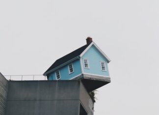Apologies, but this is how i feel tonight blue concrete storey house on top of building at daytime