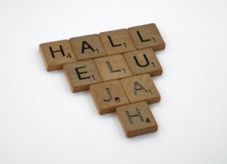 9/23/22 brown wooden puzzle blocks on white surface