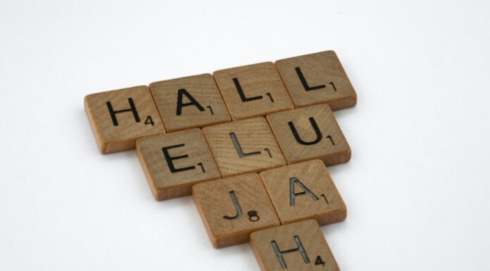 9/23/22 brown wooden puzzle blocks on white surface