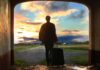 Rearrangements man holding luggage photo