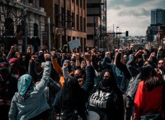 To My Dearest Whore (City) people standing on street during daytime