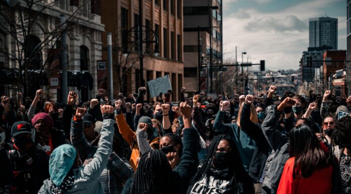 To My Dearest Whore (City) people standing on street during daytime