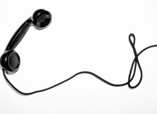 I WANT TO TALK TO SOMEONE ABOUT SOMETHING THAT MATTERS black corded telephone