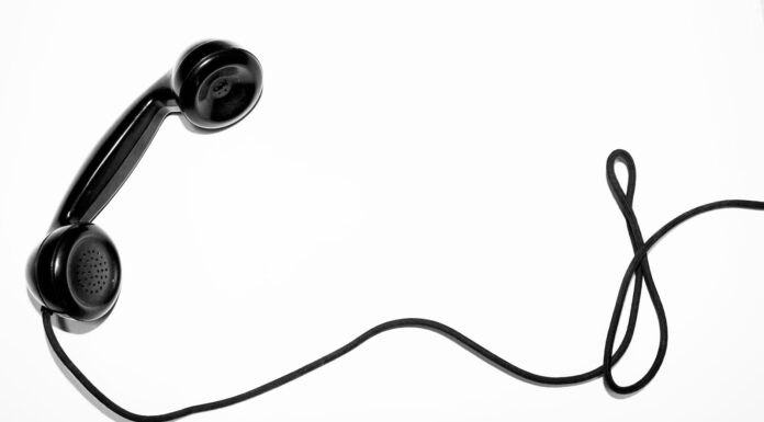 I WANT TO TALK TO SOMEONE ABOUT SOMETHING THAT MATTERS black corded telephone