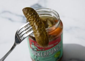 Headliner stainless steel fork on green labeled can