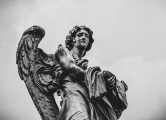 POSTCARD FROM MY SICKNESS #1 grayscale photo of woman statue