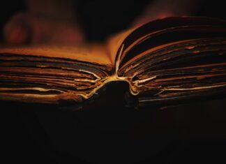 The Book of Unknowing person reading book