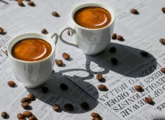 Regret white ceramic mug with coffee