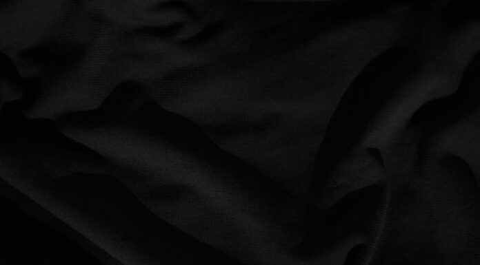 11 Million Buttons black textile on white textile