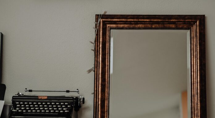 since the reading black typewriter on brown wooden table