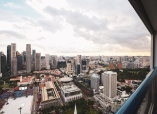 Penthouse overlooking city buildings and trees