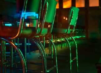 I Ask You stainless steel framed green chairs