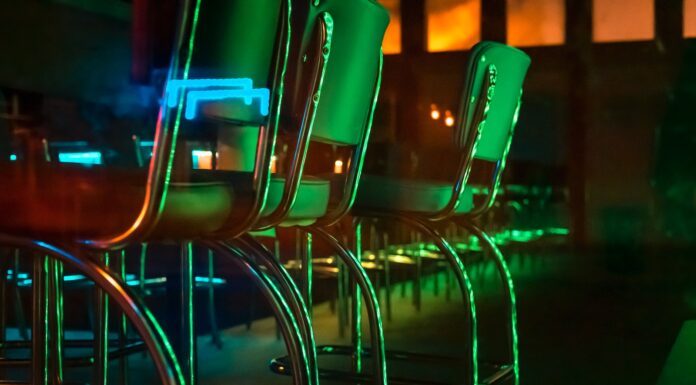 I Ask You stainless steel framed green chairs