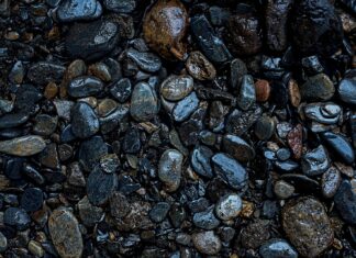 haiku’ish gray and black stones on water