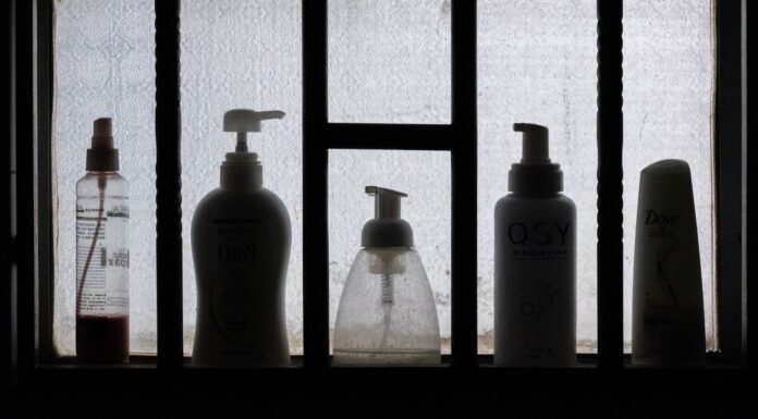 HERMIT 3 bottles on black wooden shelf