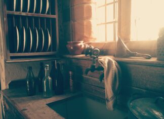 Tanka for Zayda towel on faucet near dish rack