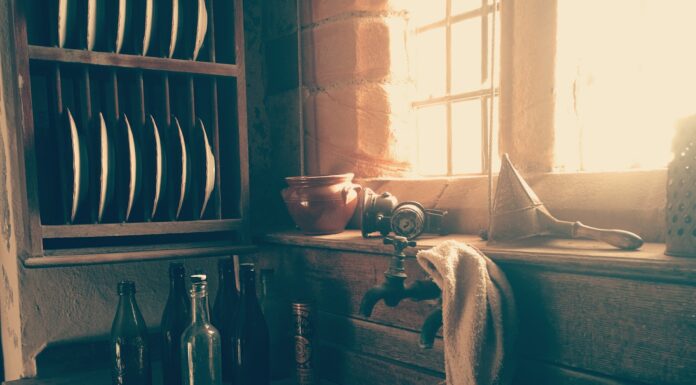 Tanka for Zayda towel on faucet near dish rack