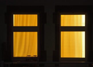 6:11 a.m. black wooden framed glass window