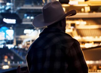 10-Gallon Hat man in black and white checkered dress shirt wearing white cowboy hat