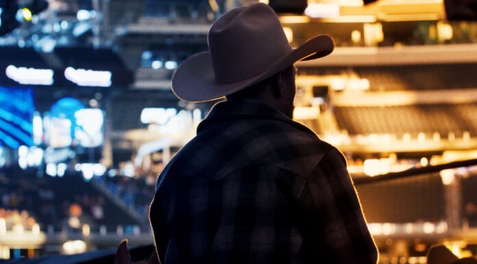 10-Gallon Hat man in black and white checkered dress shirt wearing white cowboy hat