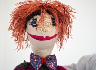 None of My Business closeup photo of puppet