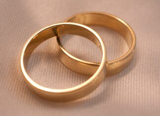 After her best friend’s hubby’s funeral gold ring on white textile