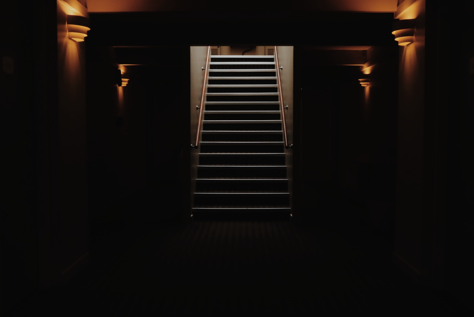 black staircase in dark room
