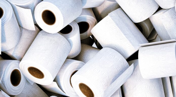 Last Call a pile of white toilet paper sitting next to each other