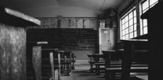 Two Requests a black and white photo of a classroom