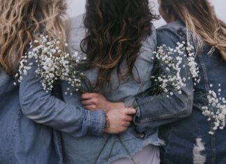 Sisters group of women facing backward