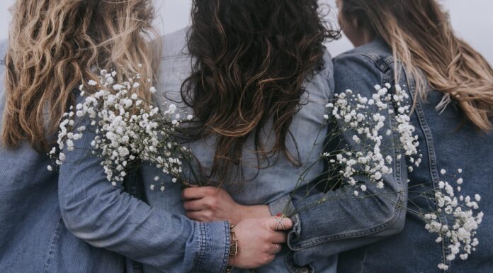 Sisters group of women facing backward