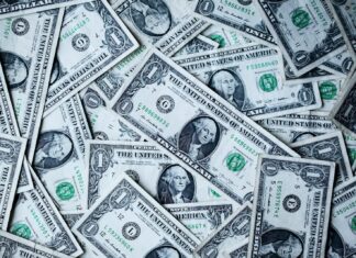 Why America’s Democracy Is Going Bankrupt 1 U.S.A dollar banknotes