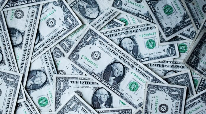 Why America’s Democracy Is Going Bankrupt 1 U.S.A dollar banknotes