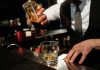 this poem is for every drunk who is sober today Close up of Barman Hands Preparing Drink
